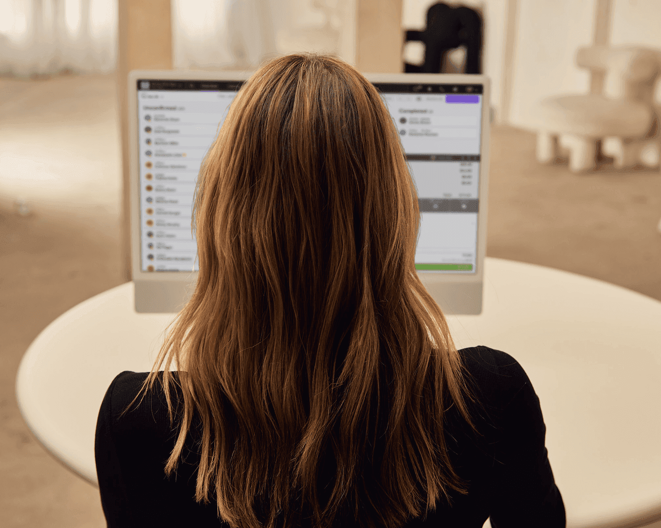 A manager reviewing business-wide reporting in Boulevard