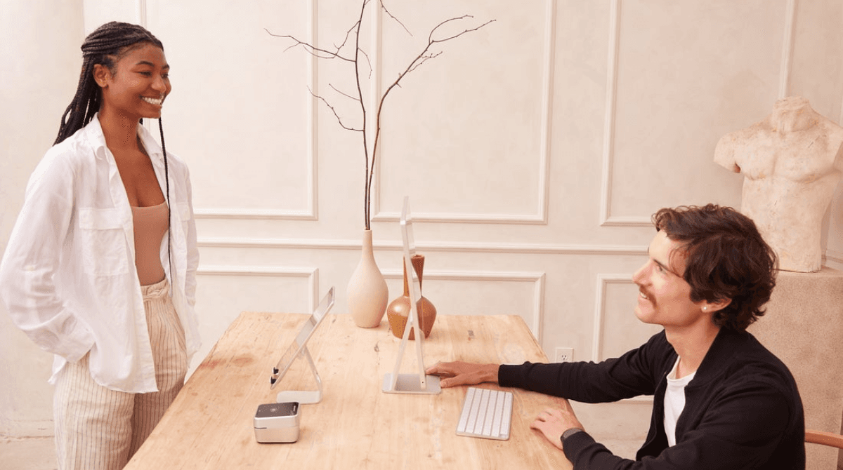 A client checks out at the point-of-sale of a self-care business.