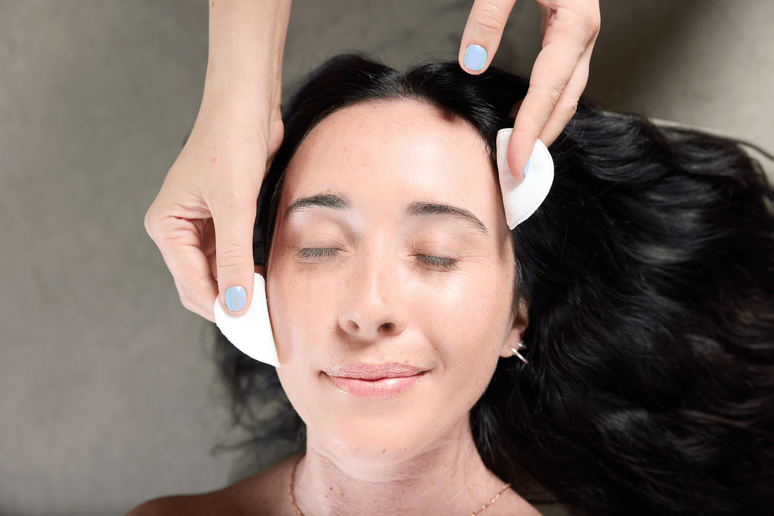 A client receives a facial treatment during her massage session.
