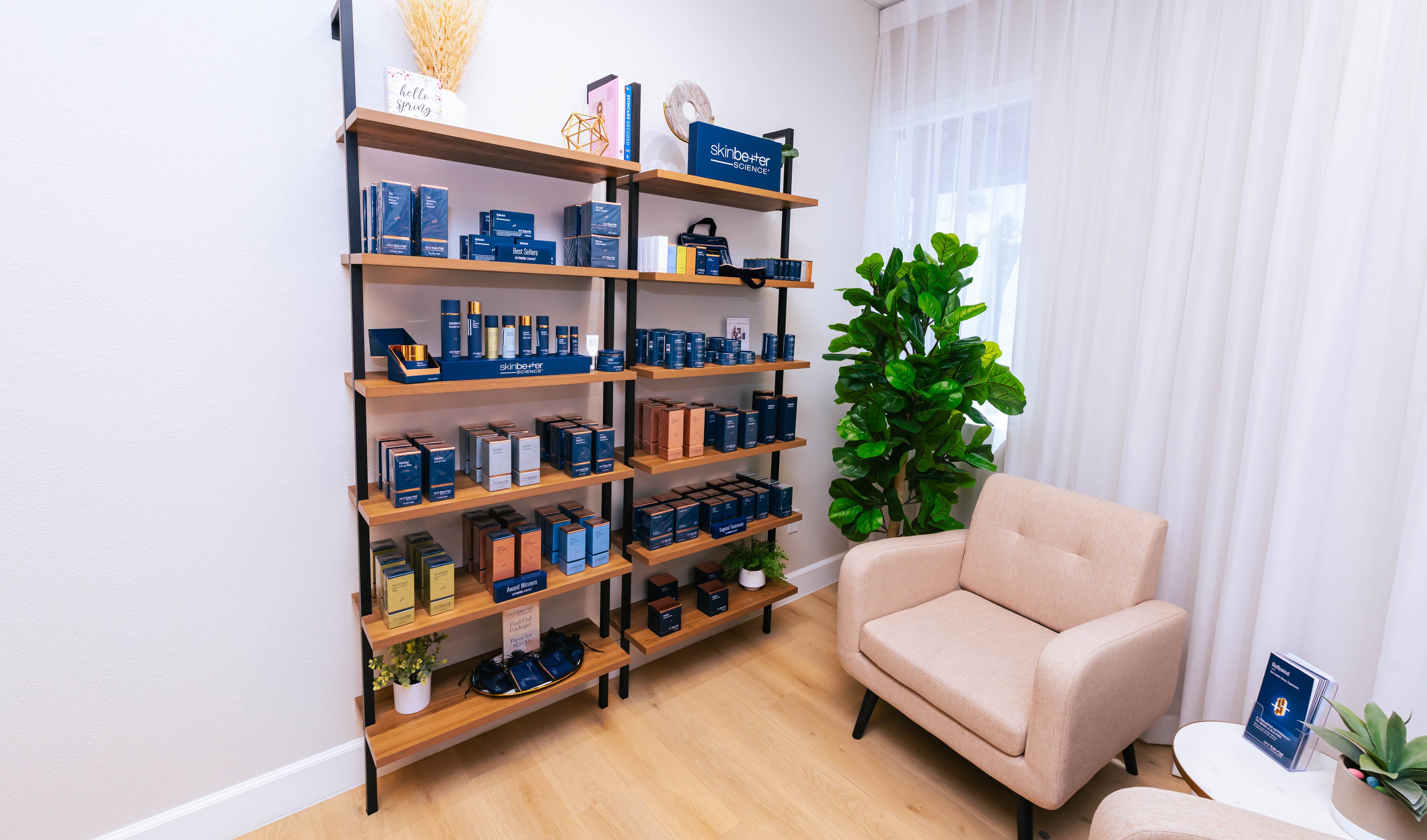 A product wall in the waiting area of a medspa.