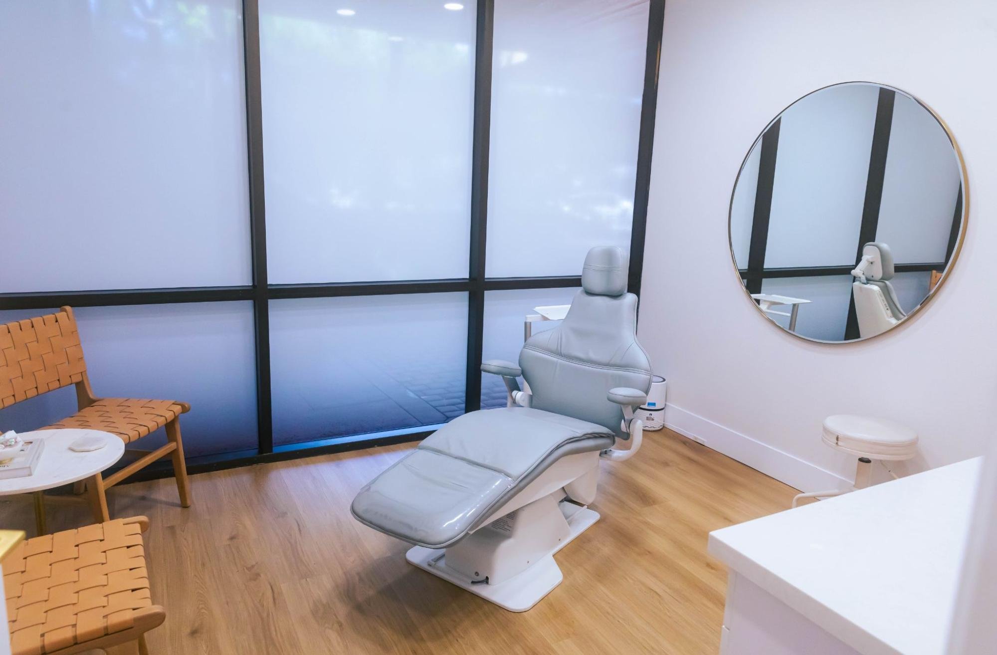 A client chair in a medspa patient room.