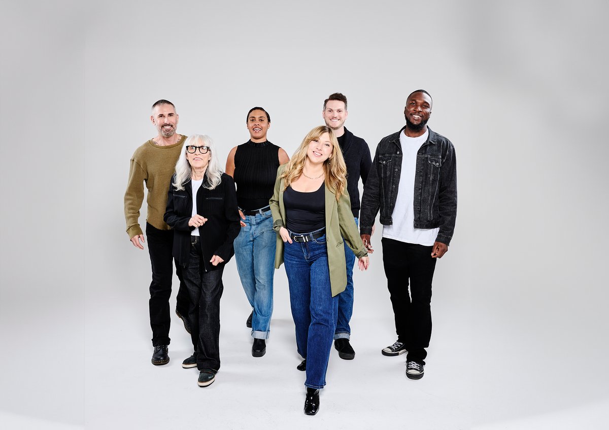 A group of self care professionals walking towards future growth.