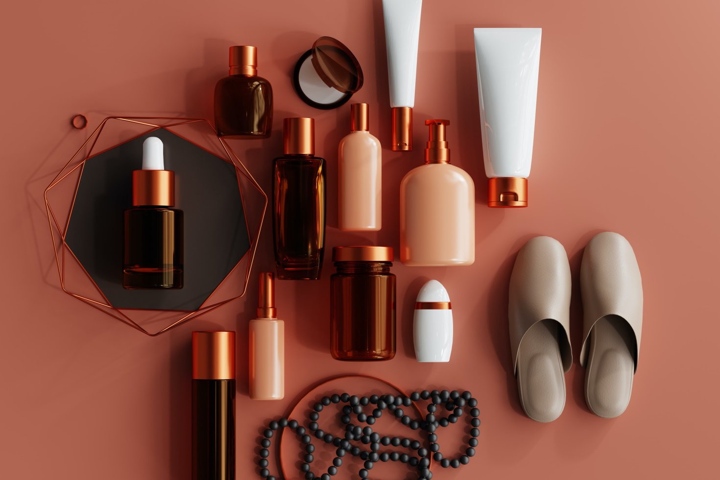 A large number of beauty products against a salmon color background.